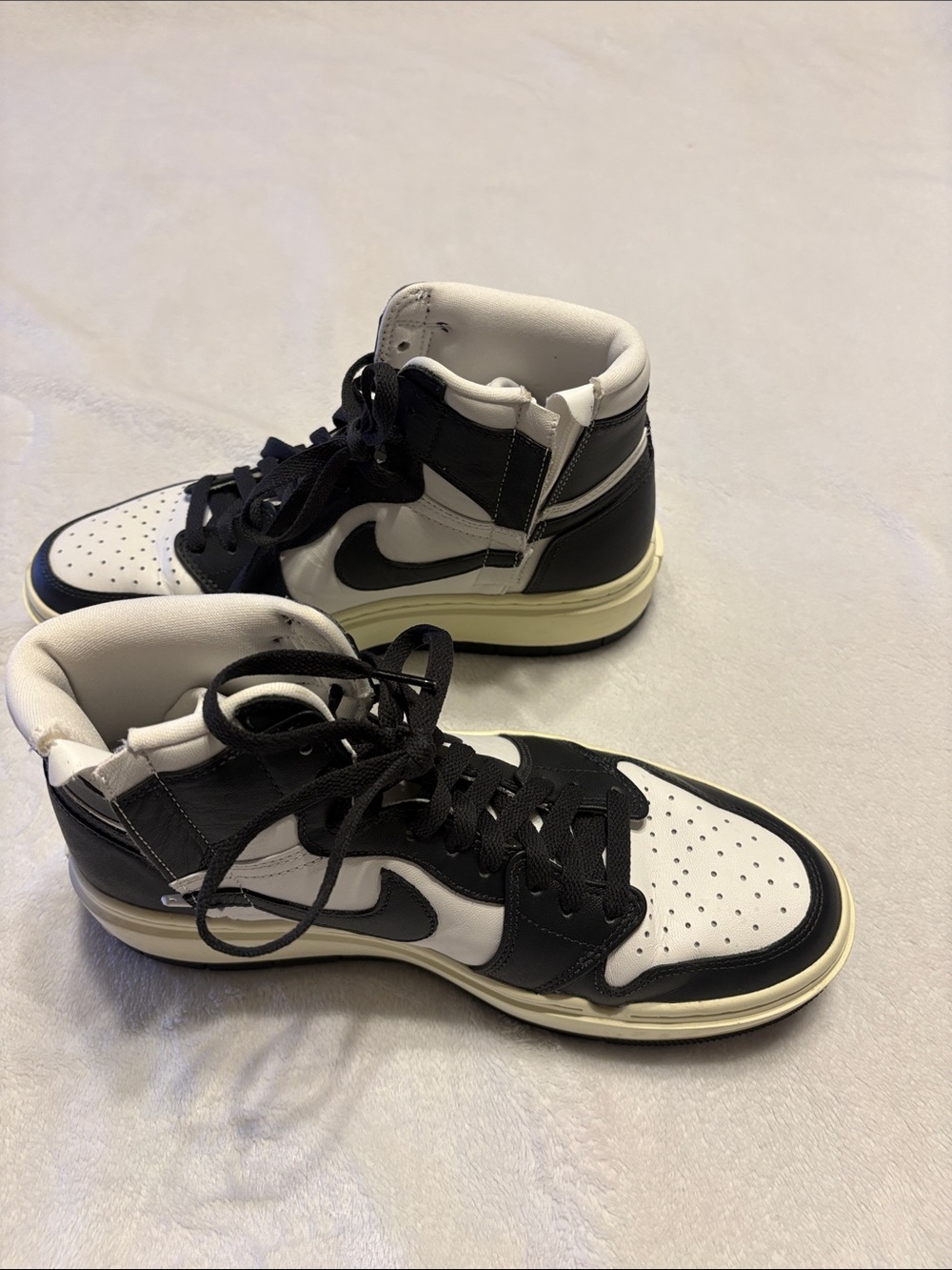 Women’s Air Jordan 1 Elevate High in Summit White / Dark Ash / Coconut Milk.
